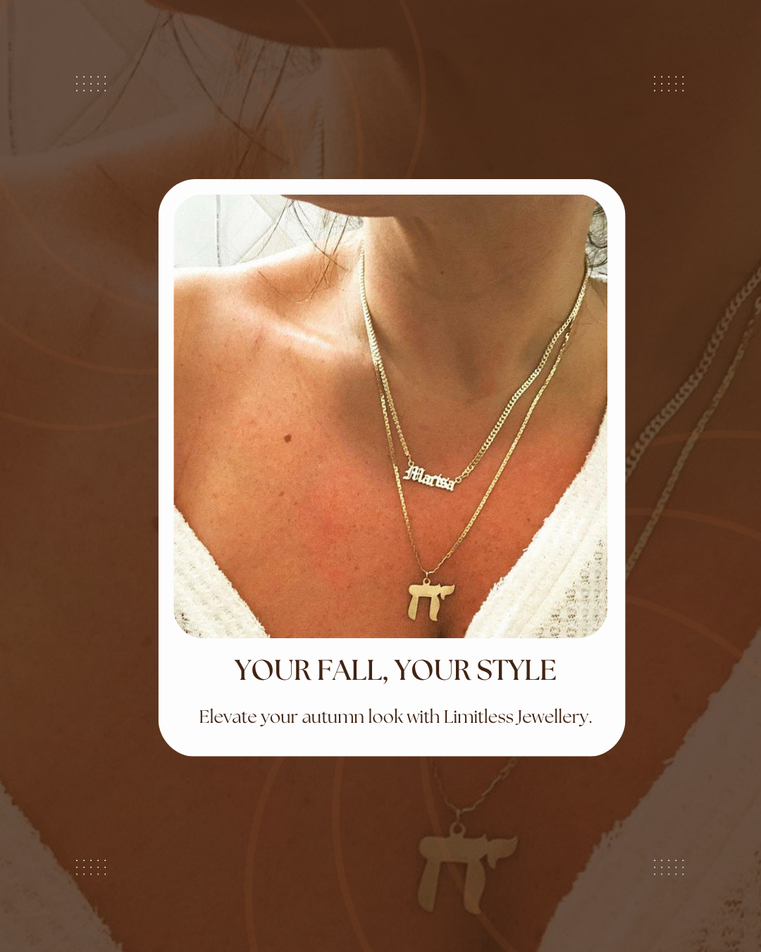 Close-up of a woman wearing layered gold necklaces, including a name pendant and a symbolic charm, styled with a white knit top.